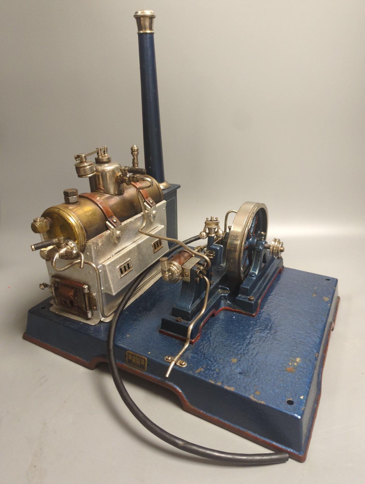 A Marklin spirit-fired live steam stationary engine with 10cm flywheel, 1920’s, and a smaller stationary engine